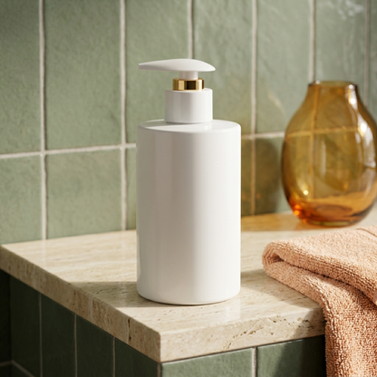 White honey body lotion on a warm sage bathroom shelf